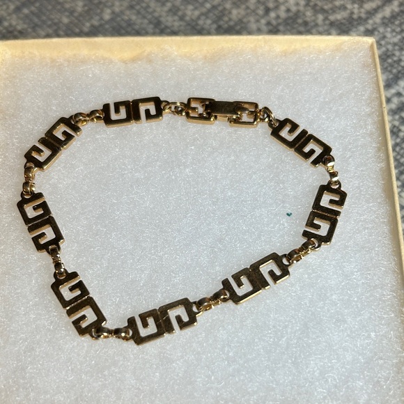Givenchy Jewelry - 269. Givenchy Gold G link Bracelet with COA